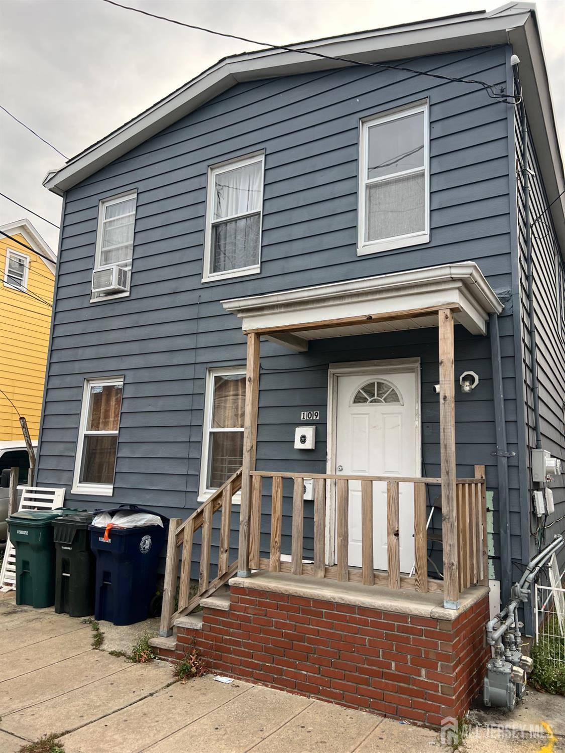 109 Washington Street, Unit 2 Perth Amboy, NJ 08861 - Photo 1 of 12 a front view of a house