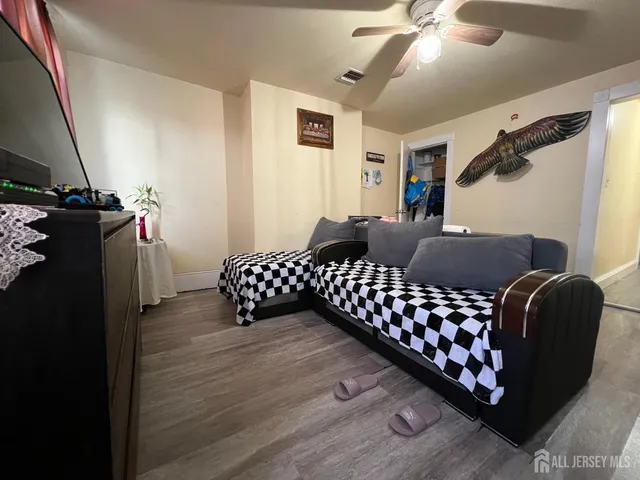 a kitchen with sink refrigerator and microwave