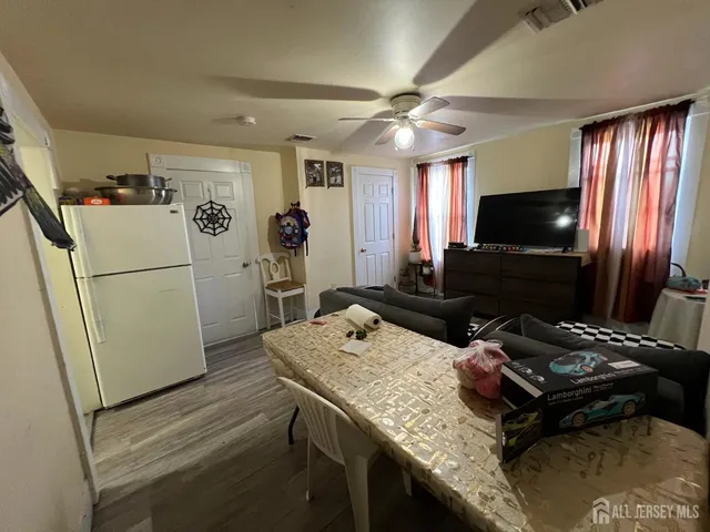 a kitchen with stainless steel appliances granite countertop a stove and a microwave