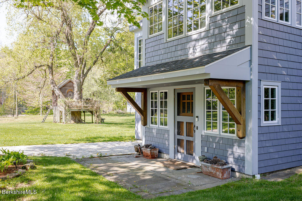 17 Cronk Road Monterey, MA 01245 - Photo 61 of 79 front view of a house with a yard