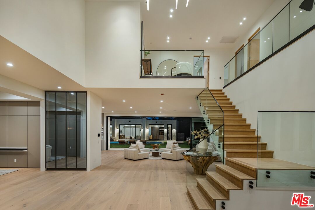 17055 Rancho Street Encino, CA 91316 - Photo 2 of 73 a view of living room with furniture and wooden floor