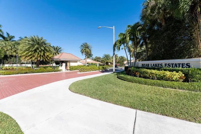 a view of a park with plants and trees