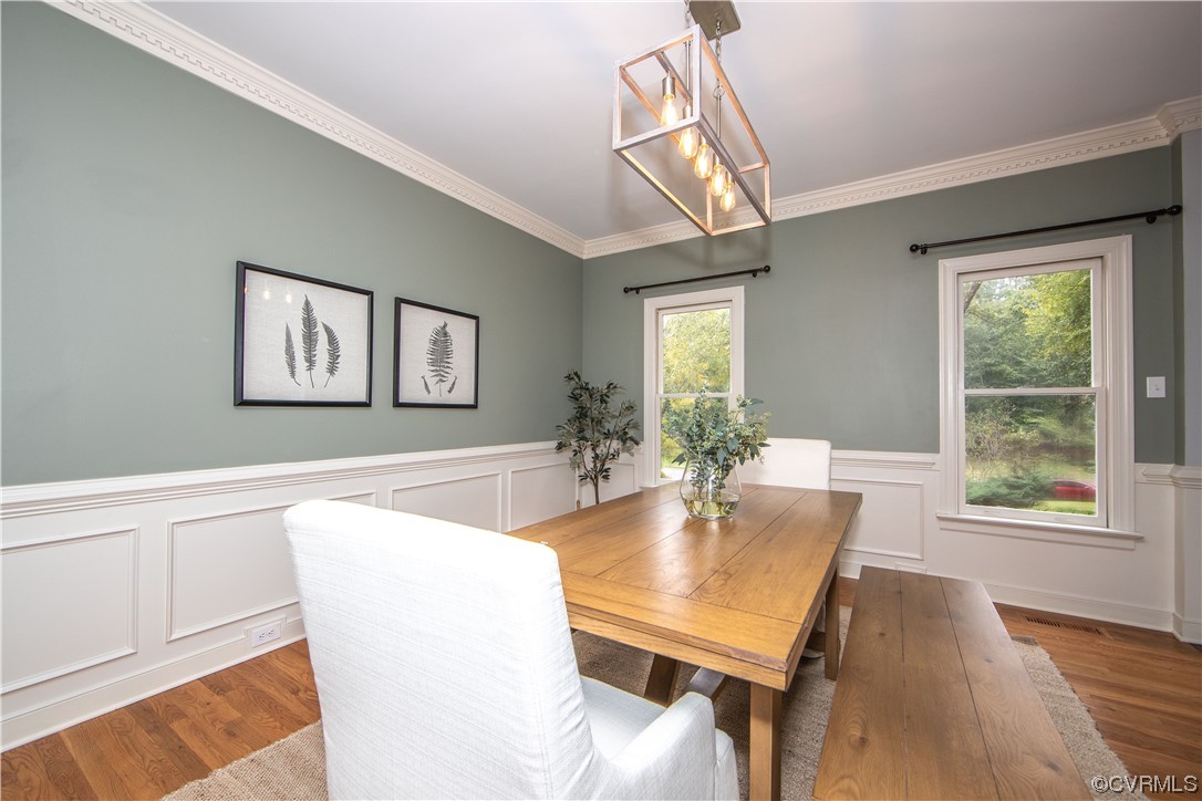 2425 Hartlepool Lane Midlothian, VA 23113 - Photo 14 of 44 a view of a dining room with furniture and wooden floor