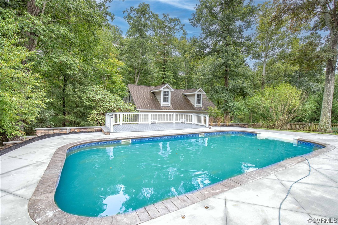 2425 Hartlepool Lane Midlothian, VA 23113 - Photo 19 of 44 a view of a swimming pool with a balcony