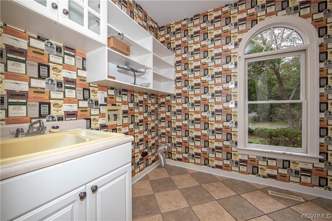 2425 Hartlepool Lane Midlothian, VA 23113 - Photo 36 of 44 a bathroom with a sink a toilet and a shower curtain