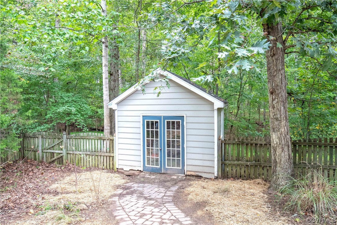 2425 Hartlepool Lane Midlothian, VA 23113 - Photo 44 of 44 a view of a house with a backyard and a tree
