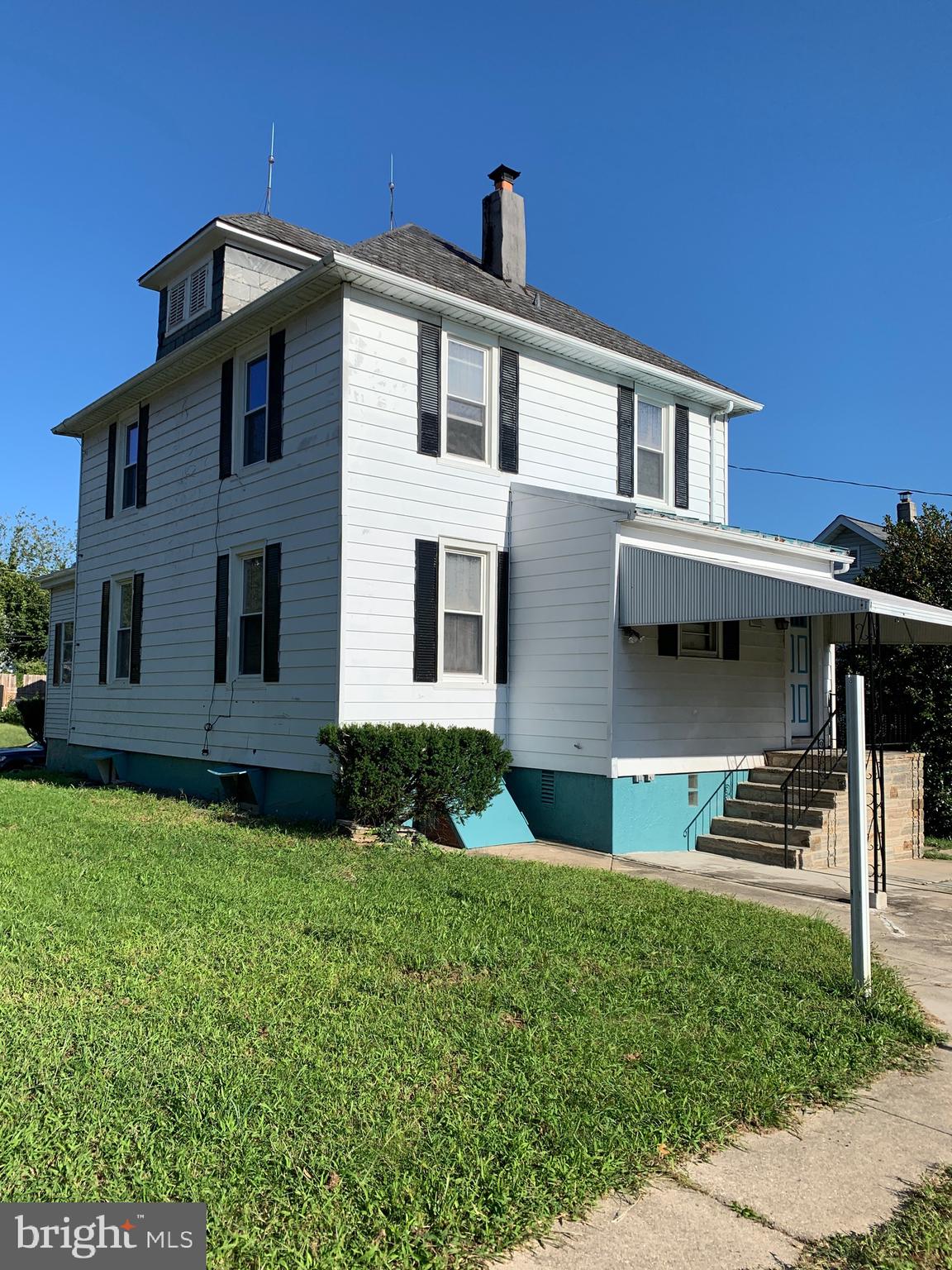 4101 Marx Avenue Baltimore, MD 21206 - Photo 2 of 42 a front view of a house with a yard