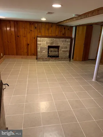 a view of backyard with sitting area