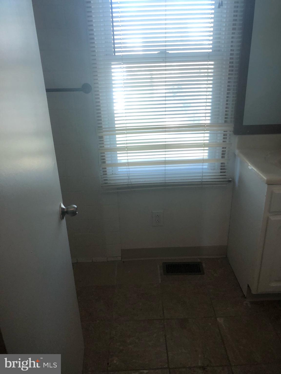 4101 Marx Avenue Baltimore, MD 21206 - Photo 38 of 42 a view of a small space with a window