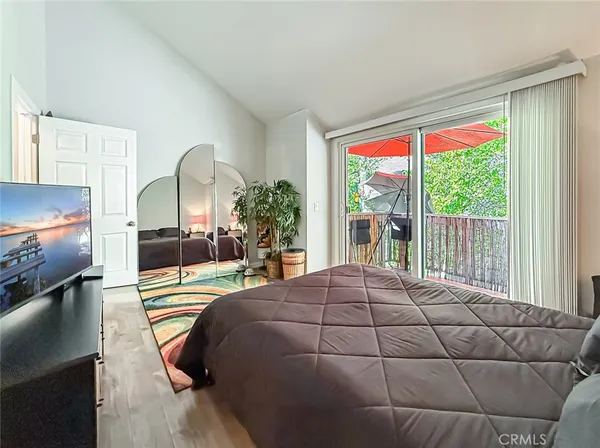 a view of a bathroom with tub and shower