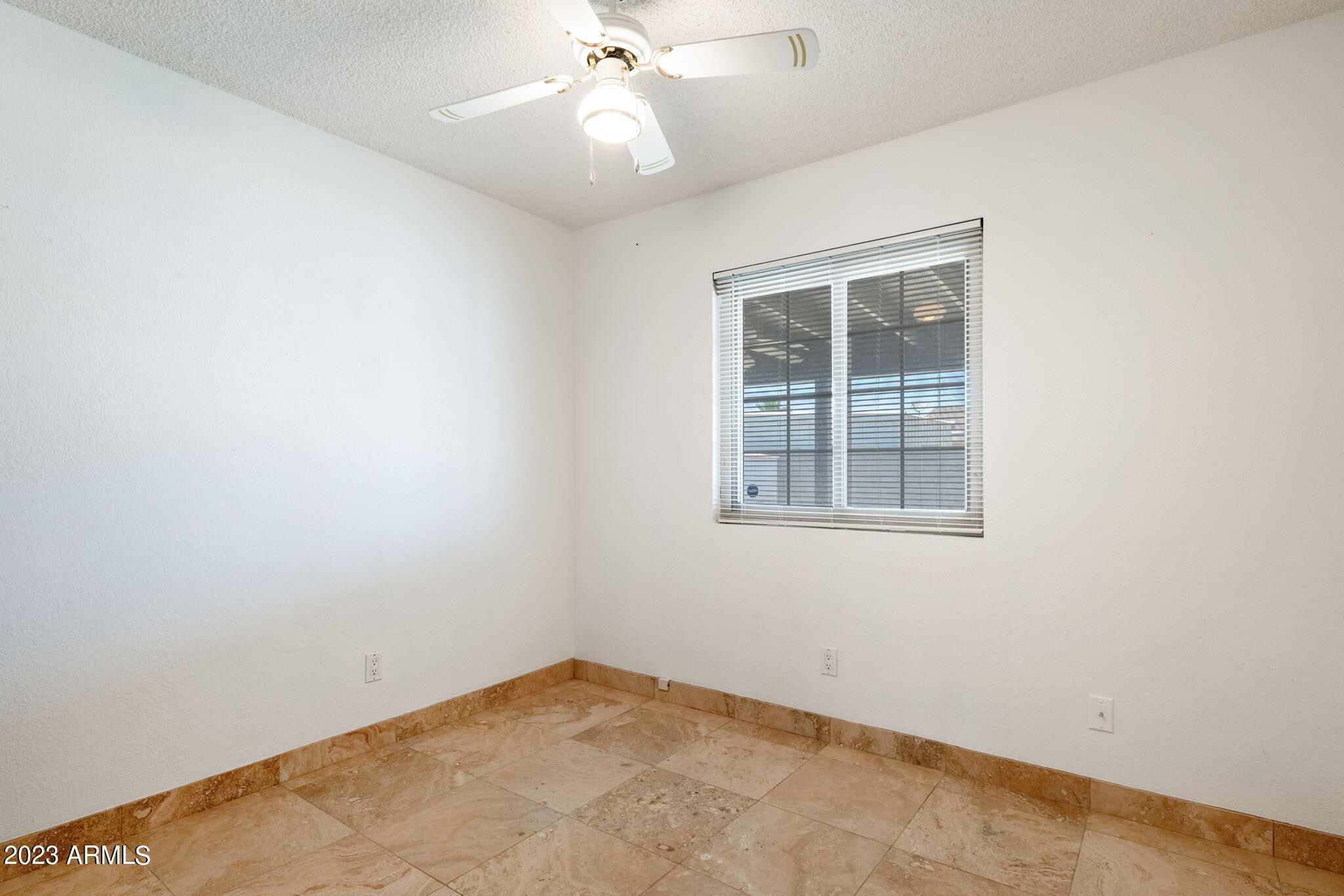 964 West Hackamore Street Mesa, AZ 85201 - Photo 16 of 24 an empty room with a window