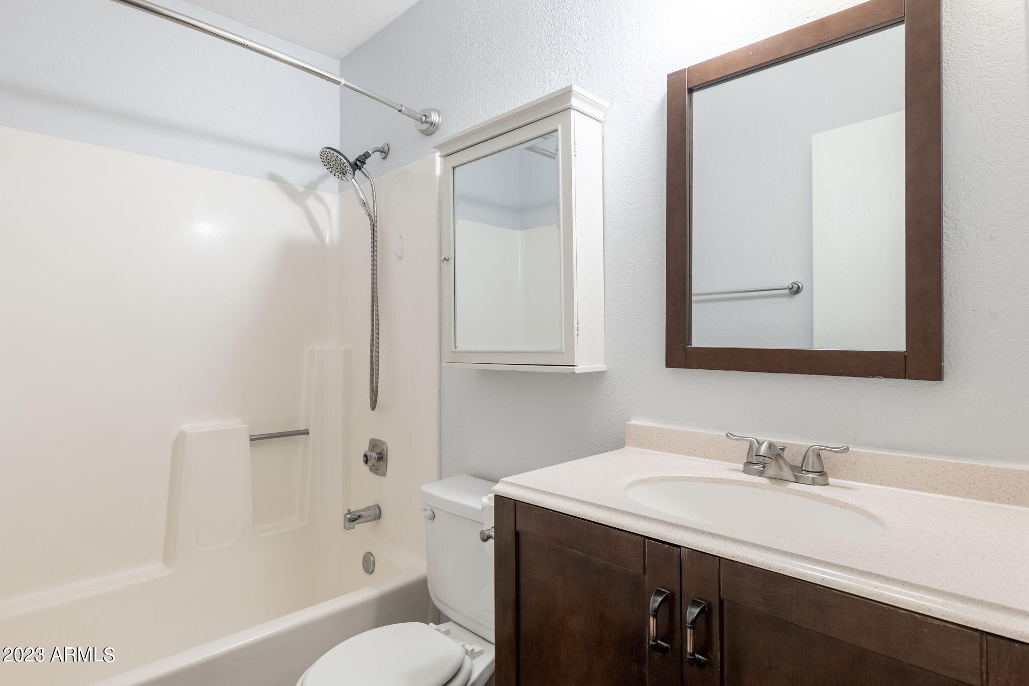 964 West Hackamore Street Mesa, AZ 85201 - Photo 20 of 24 a bathroom with a granite countertop sink toilet and shower