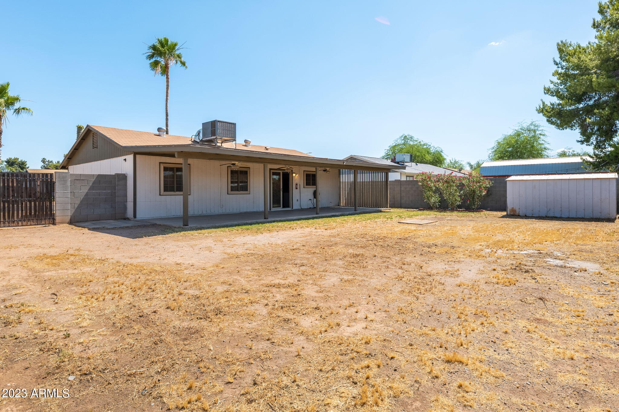 964 West Hackamore Street Mesa, AZ 85201 - Photo 23 of 24 a view of a house with a swimming pool