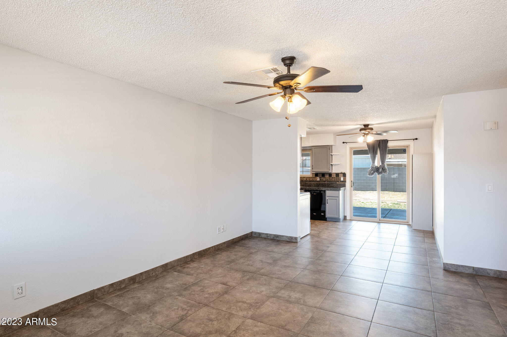964 West Hackamore Street Mesa, AZ 85201 - Photo 7 of 24 a view of an empty room and window