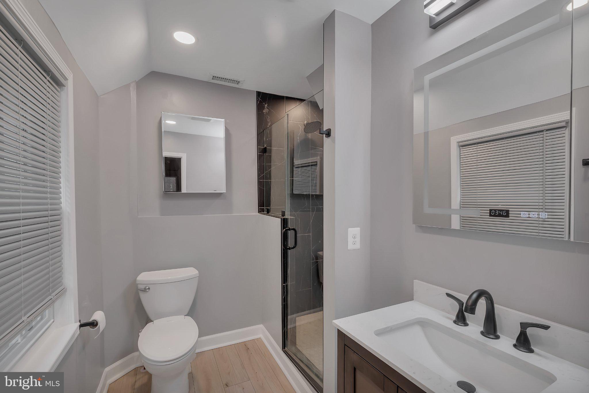 1706 North Glebe Road Arlington, VA 22207 - Photo 17 of 36 Sleek modern bathroom retreat.