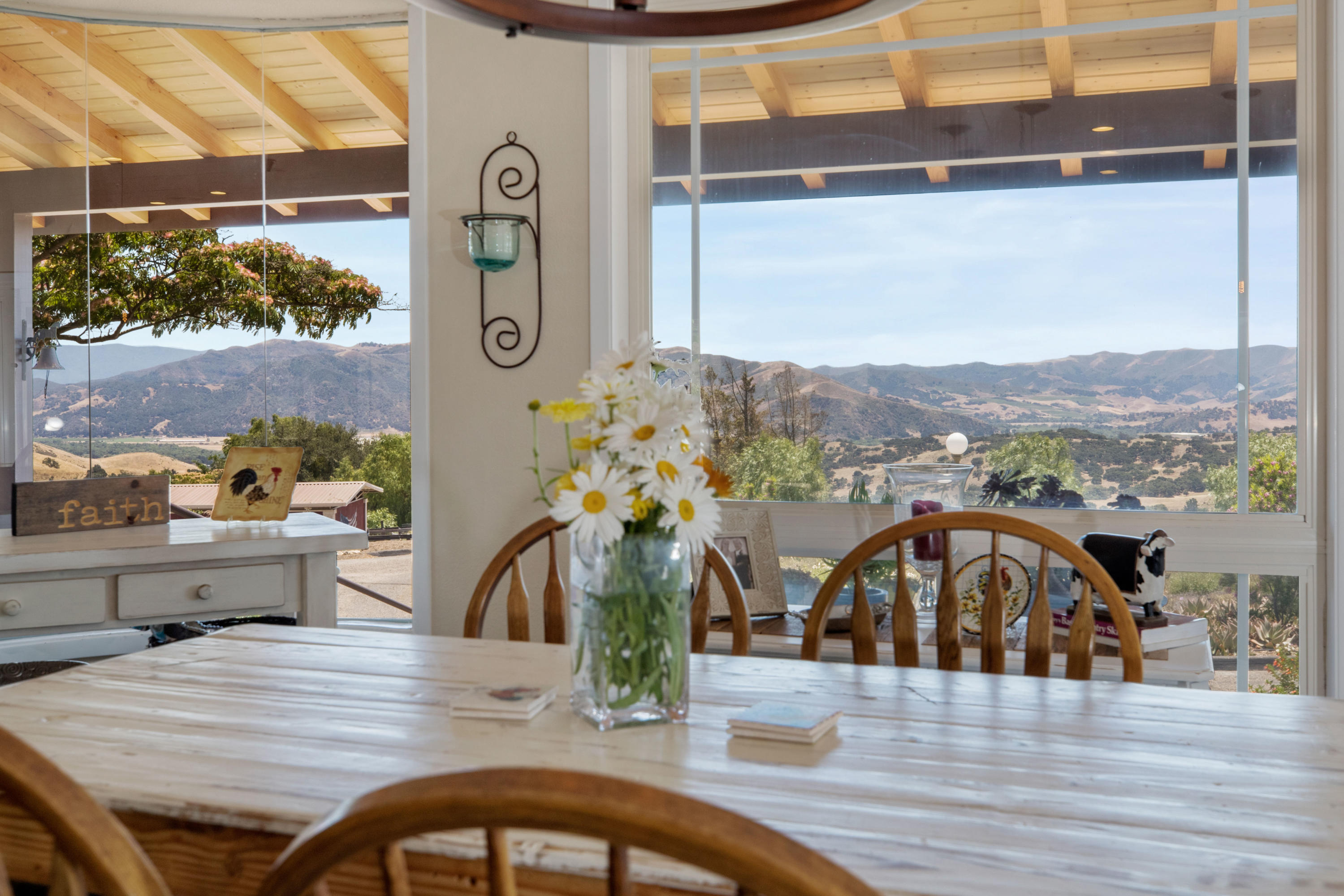 1833 Cougar Ridge Road Buellton, CA 93427 - Photo 14 of 49 a view of a dining room with furniture window and wooden floor