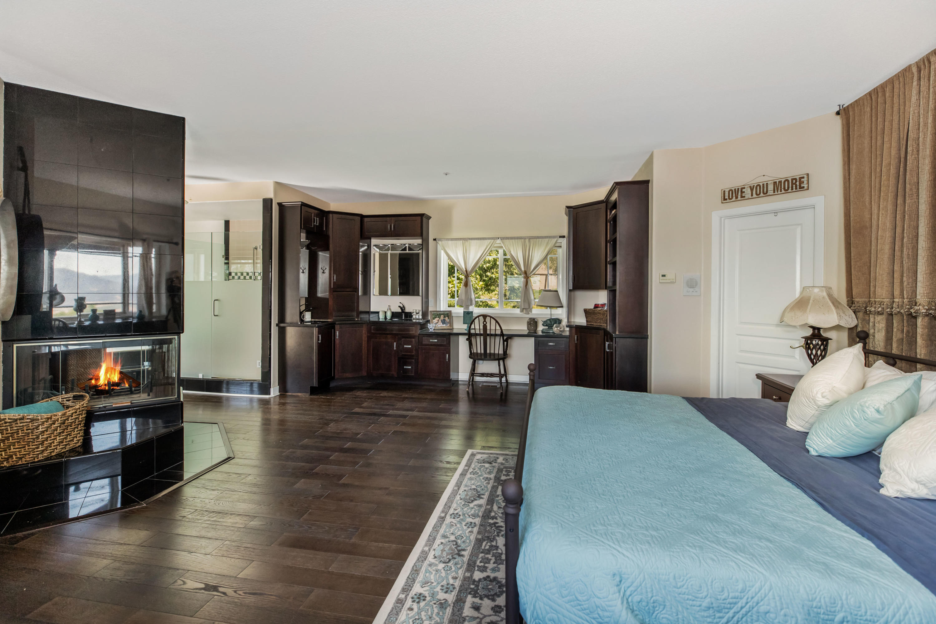 1833 Cougar Ridge Road Buellton, CA 93427 - Photo 16 of 49 a living room with furniture and a flat screen tv