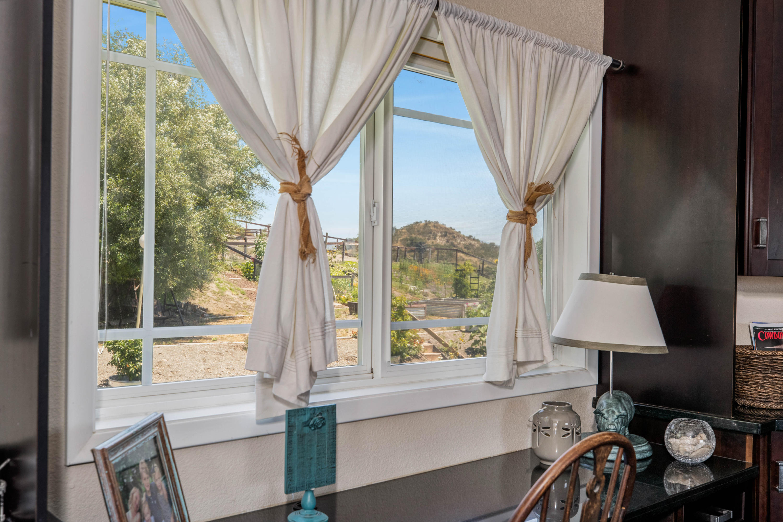 1833 Cougar Ridge Road Buellton, CA 93427 - Photo 18 of 49 a front view of a house with garden