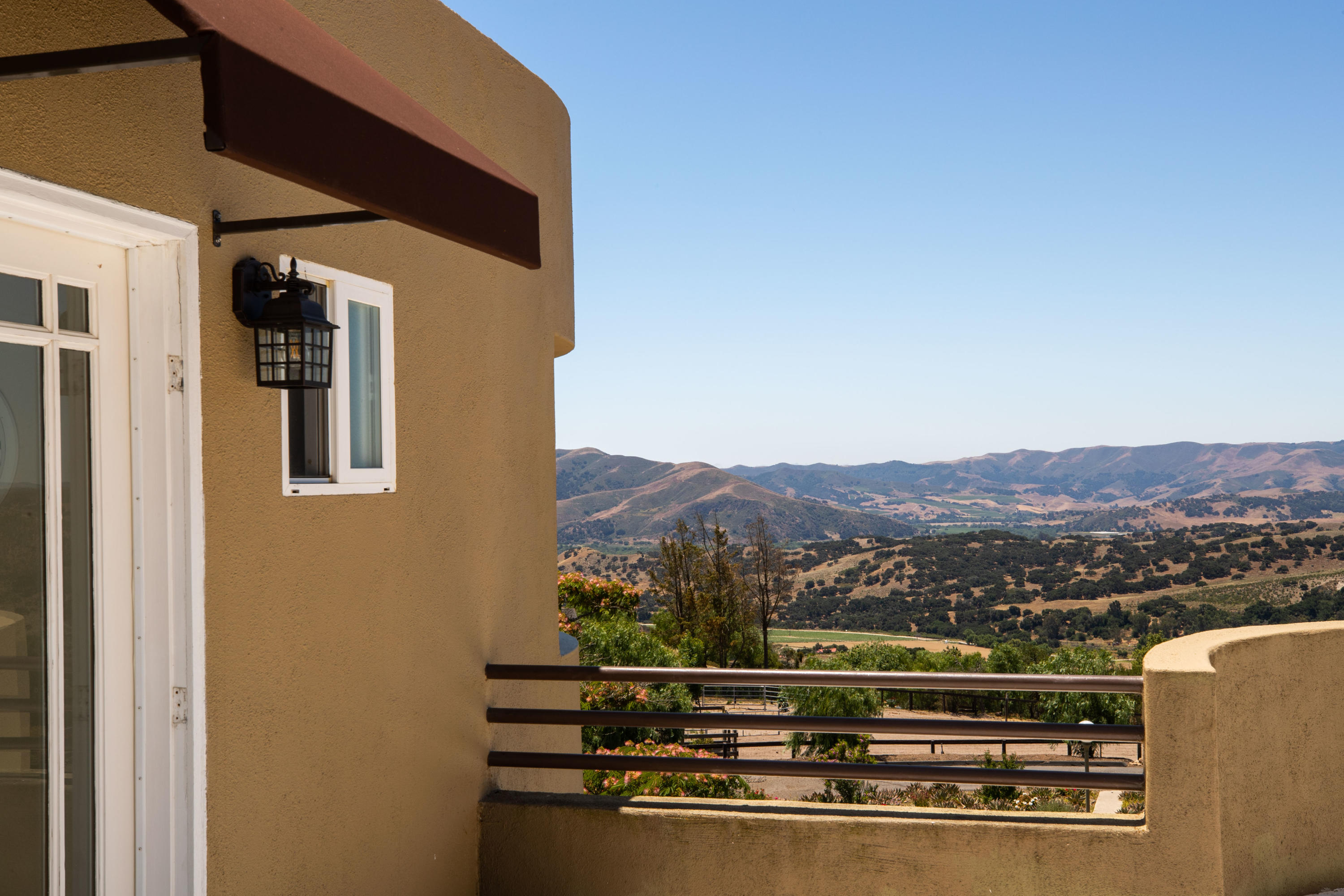 1833 Cougar Ridge Road Buellton, CA 93427 - Photo 26 of 49 a view of a city from a balcony