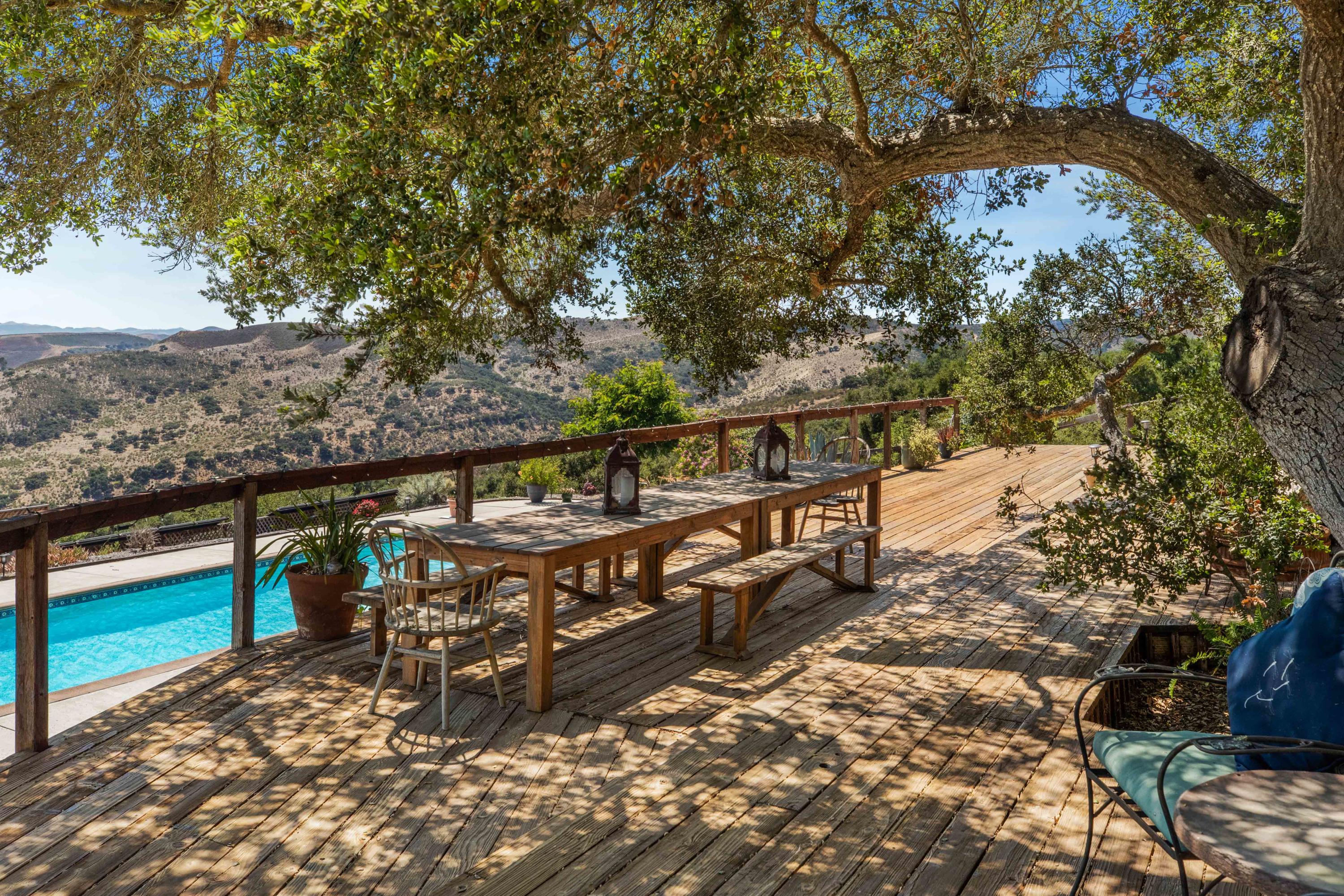 1833 Cougar Ridge Road Buellton, CA 93427 - Photo 30 of 49 a view of a balcony with chairs