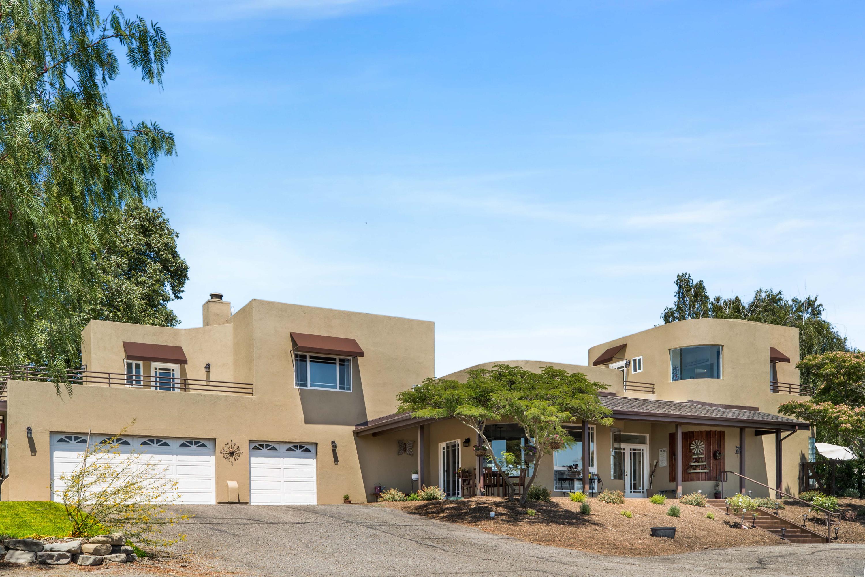 1833 Cougar Ridge Road Buellton, CA 93427 - Photo 3 of 49 a front view of residential houses with street