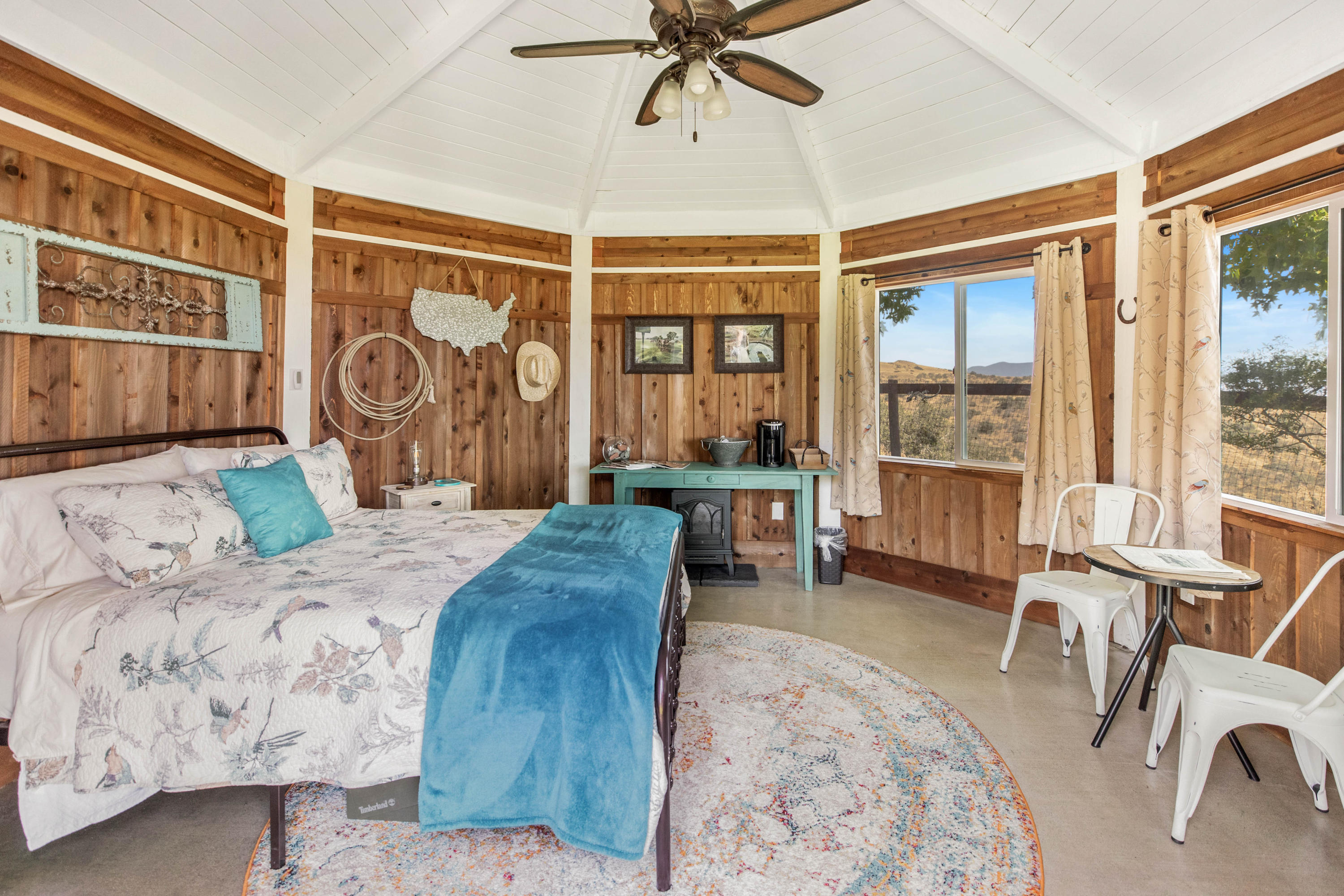 1833 Cougar Ridge Road Buellton, CA 93427 - Photo 37 of 49 a bed room with a bed and a chair