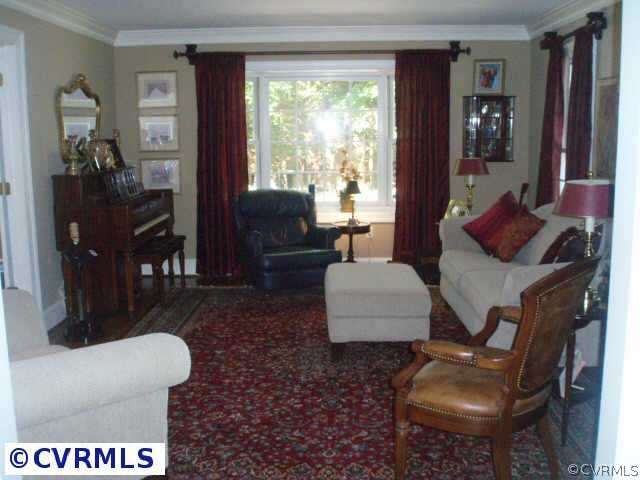 14310 West Salisbury Road Midlothian, VA 23113 - Photo 5 of 9 a living room with furniture rug and window