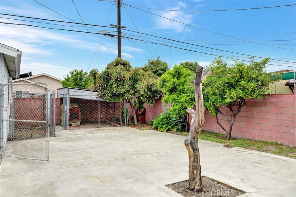 10661 Ilex Avenue Pacoima, CA 91331 - Photo 18 of 22 a view of a house with potted plants
