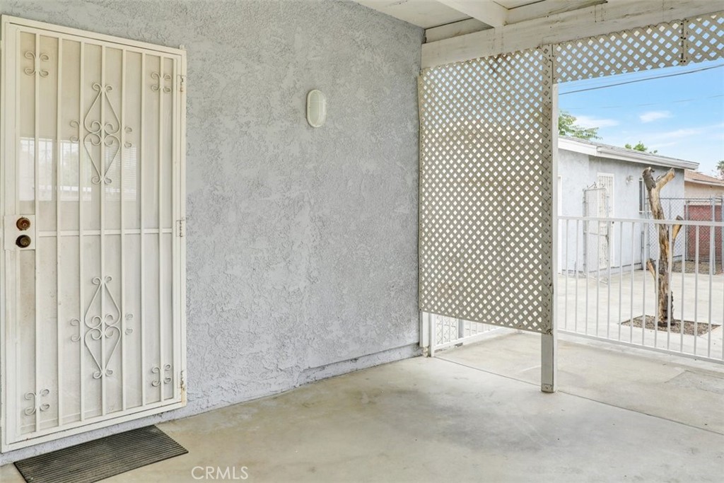 10661 Ilex Avenue Pacoima, CA 91331 - Photo 21 of 22 a view of a room with wooden floor