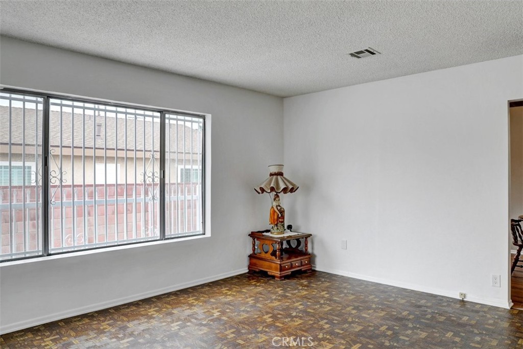 10661 Ilex Avenue Pacoima, CA 91331 - Photo 7 of 22 a view of a room with gym equipment