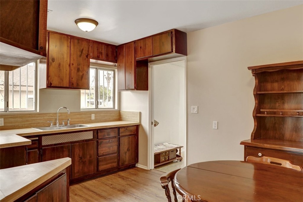 10661 Ilex Avenue Pacoima, CA 91331 - Photo 9 of 22 a kitchen with a sink appliances and cabinets