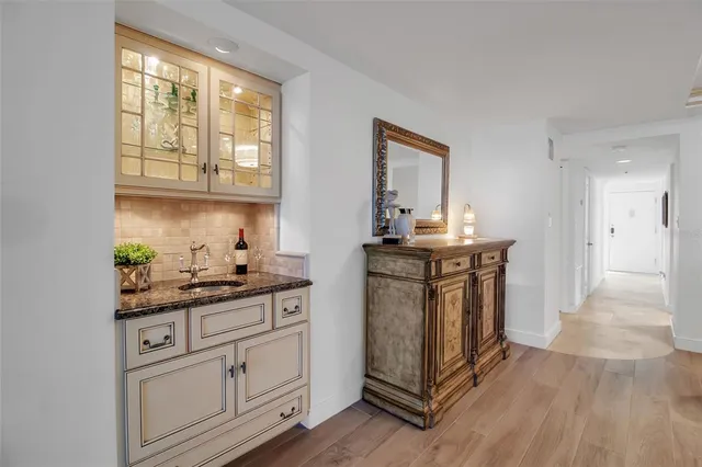 a view of a room with chairs and city view