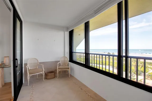 a bathroom with a granite countertop sink