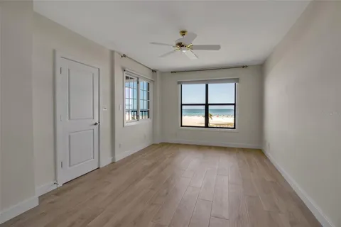 a bathroom with a shower sink vanity and toilet