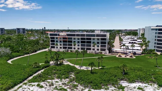 a view of a kitchen with a sink and a yard