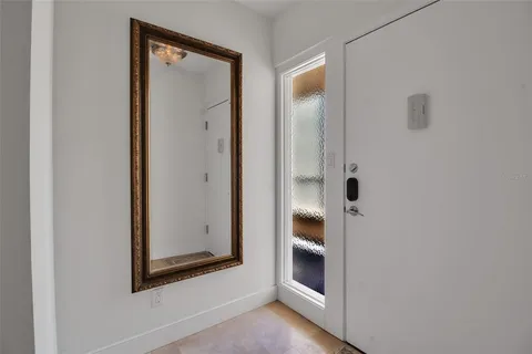 a kitchen with granite countertop a sink and cabinets