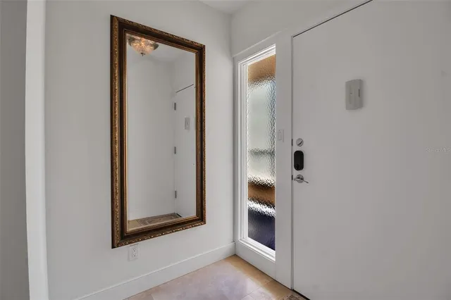 a kitchen with granite countertop a sink and cabinets