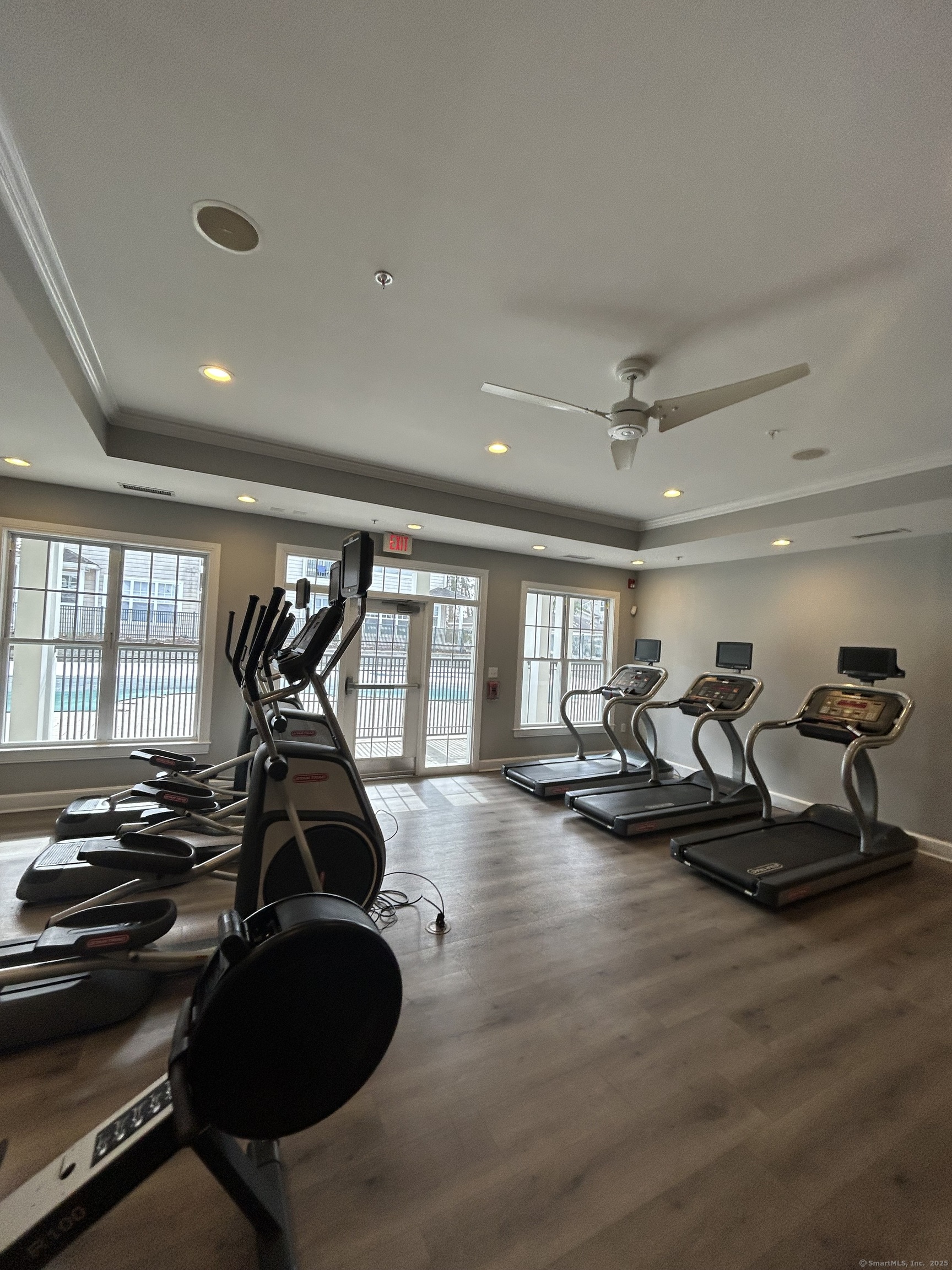 138 Hollow Tree Ridge Road, Unit 1523 Darien, CT 06820 - Photo 5 of 26 a view of a room with gym equipment