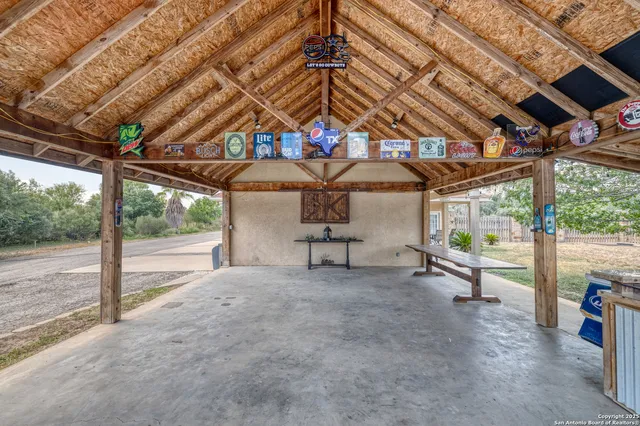 a view of a swimming pool with a patio