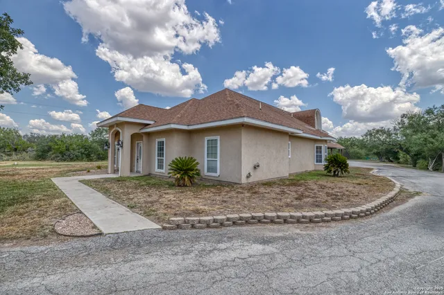 a view of a house with a entertaining space