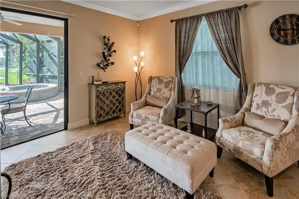 a living room with furniture and a window