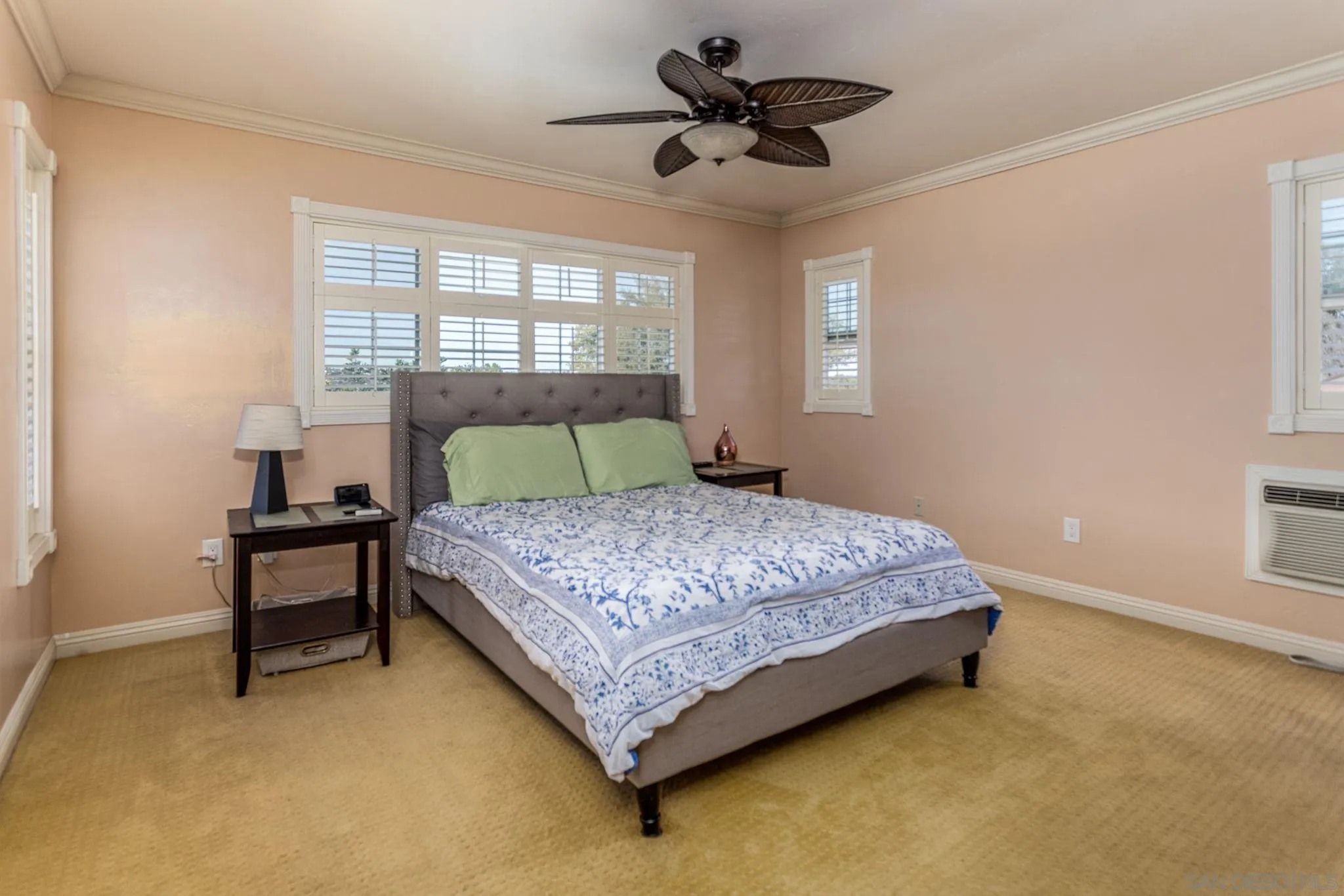 532 Kempton Street Spring Valley, CA 91977 - Photo 19 of 30 a bedroom with a bed and a table in it