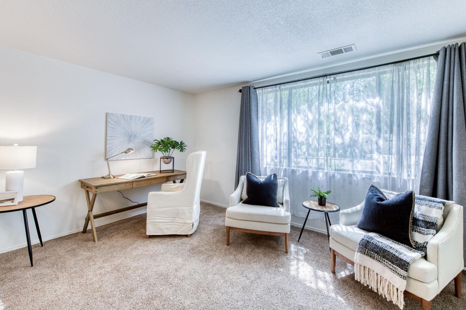 133 North Cindy Avenue Clovis, CA 93612 - Photo 13 of 19 a living room with furniture and a window