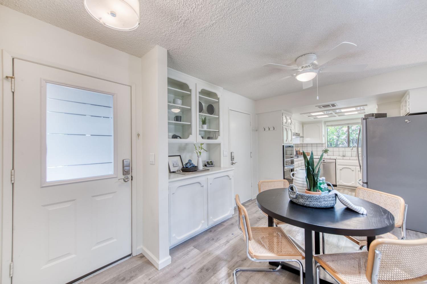 133 North Cindy Avenue Clovis, CA 93612 - Photo 3 of 19 a view of a dining room with furniture and wooden floor