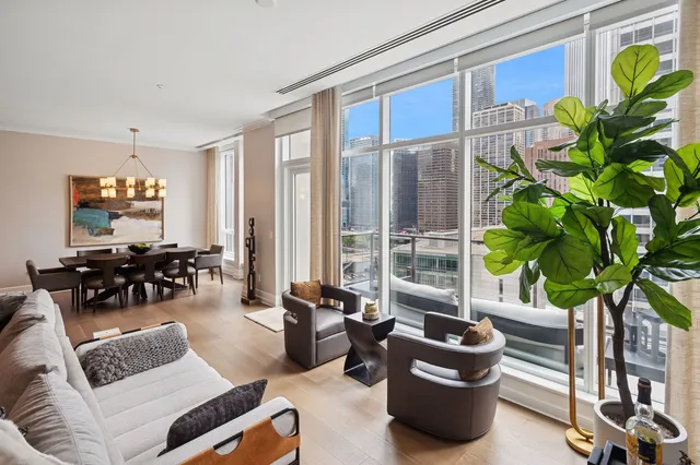 a bathroom with a sink mirror vanity and toilet