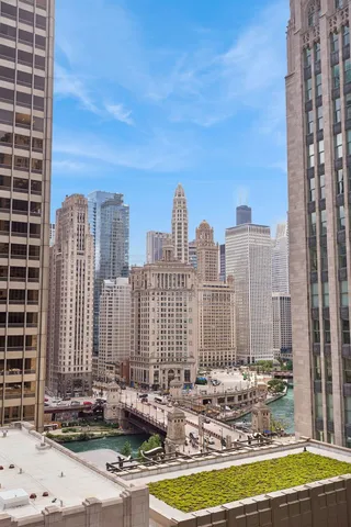 a bedroom with a large bed and a television