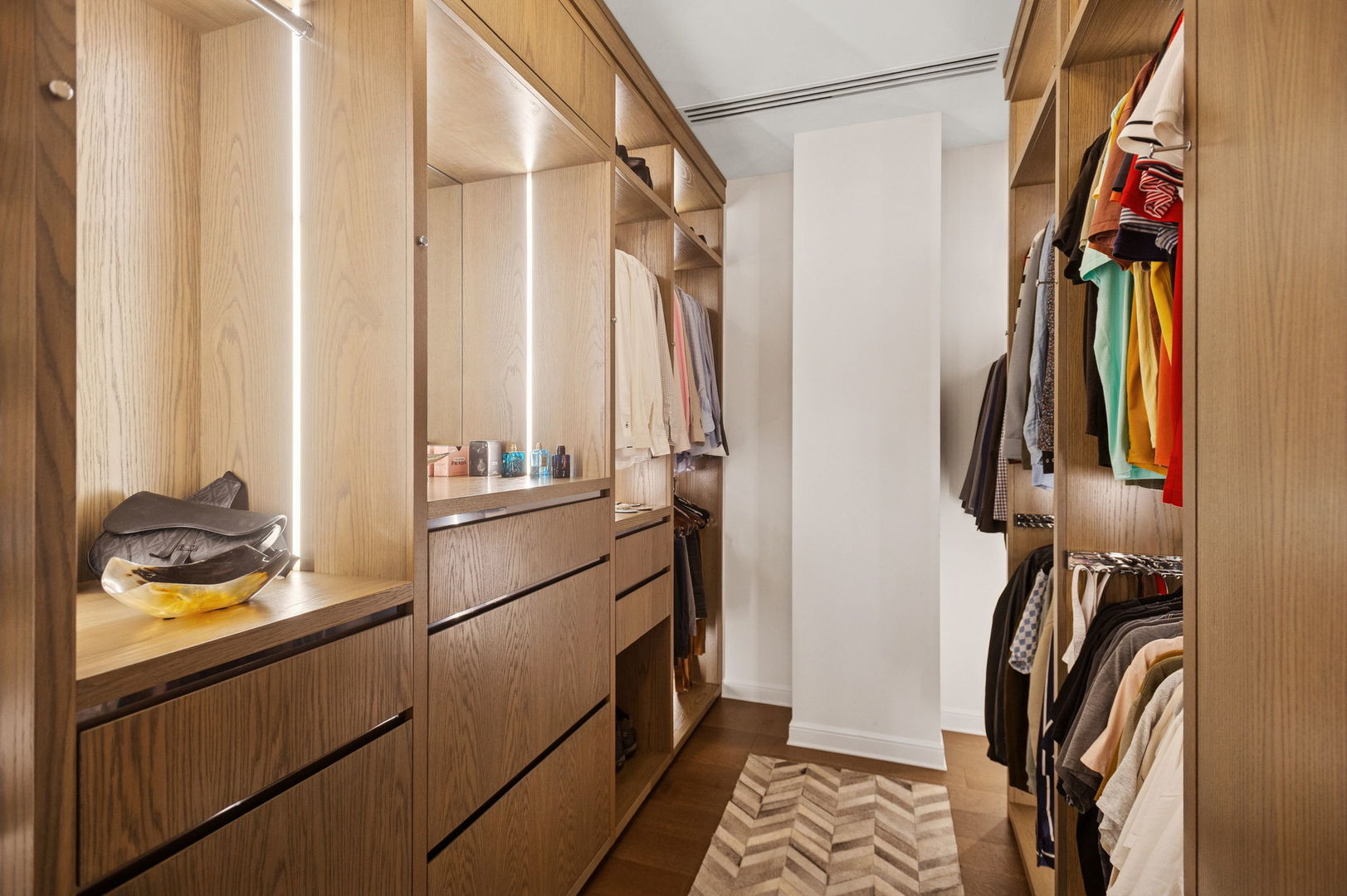 435 North Michigan Avenue, Unit 1112 Chicago, IL 60611 - Photo 28 of 70 a view of walk in closet with clothes and shoes