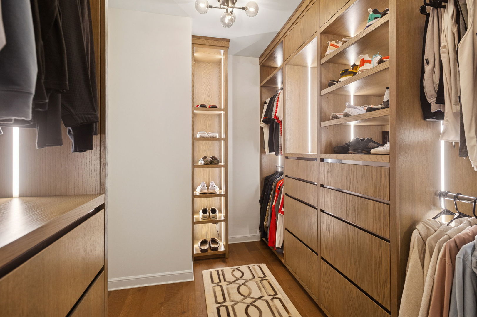 435 North Michigan Avenue, Unit 1112 Chicago, IL 60611 - Photo 29 of 70 a view of walk in closet with clothes and shoes