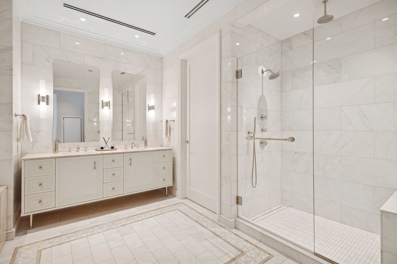 435 North Michigan Avenue, Unit 1112 Chicago, IL 60611 - Photo 33 of 70 a bathroom with a shower sink and mirror