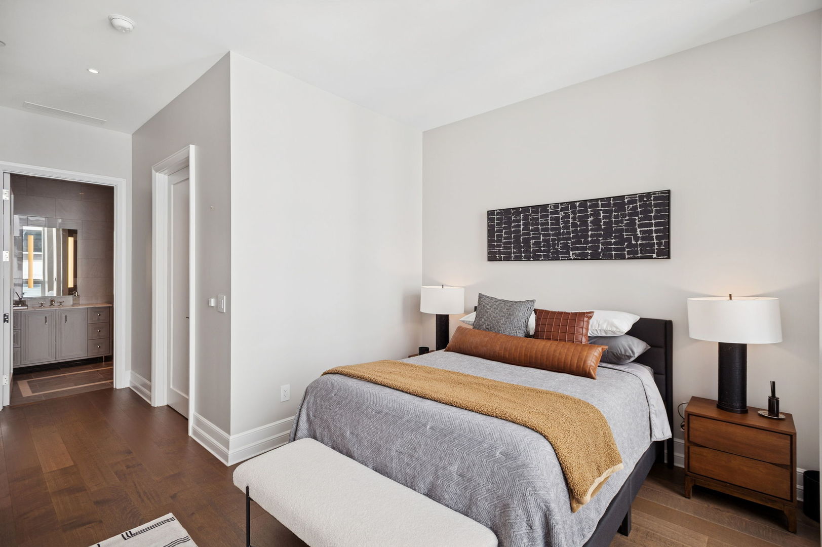 435 North Michigan Avenue, Unit 1112 Chicago, IL 60611 - Photo 35 of 70 a bedroom with a bed and wooden floor